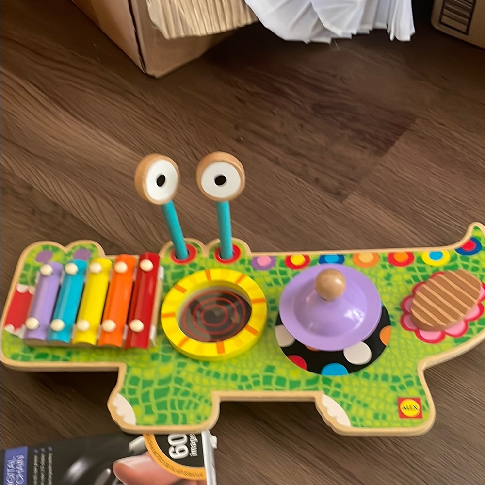 Alex Wooden Children. musical Gator Toy